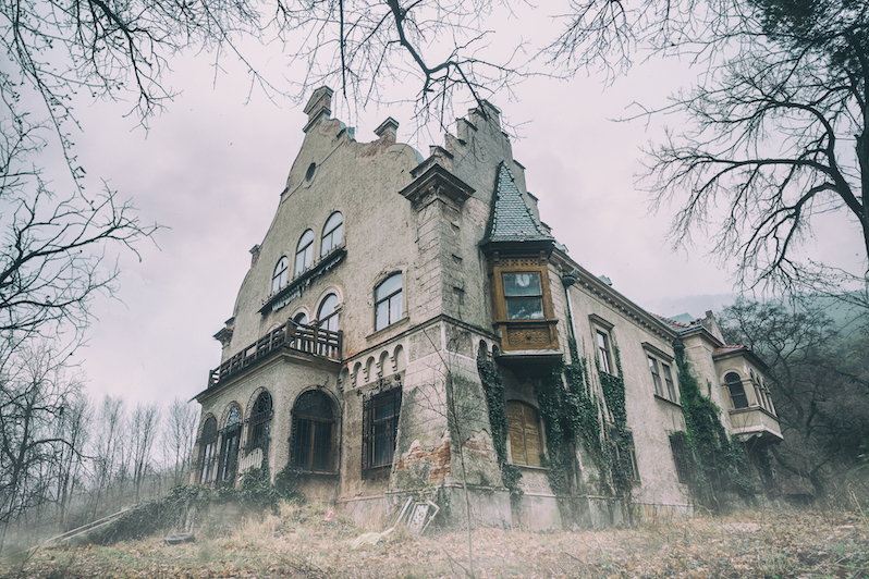 A spooky abandoned house in the forest